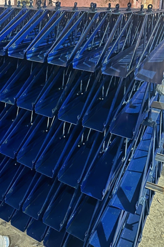 Painted span frames showing the bracing and end details.